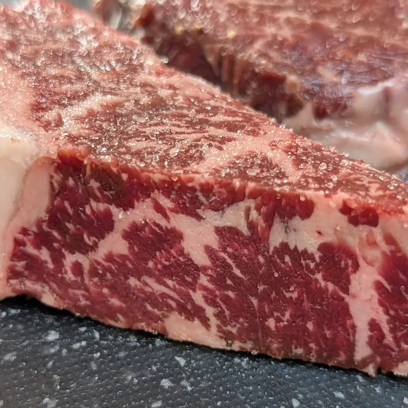 Cross section of a marbled striploin