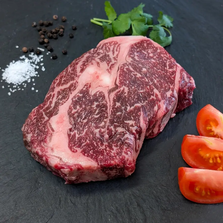 Raw Wagyu steak on slate